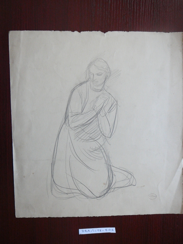 woman kneeling in prayer
